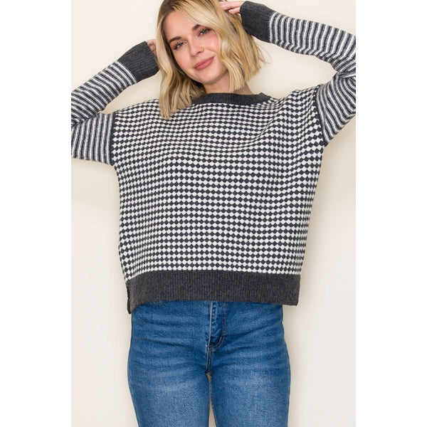 White and gray in color.  CREW NECK, LONG STRIPED SLEEVE, CHECKERBOARD, PULLOVER SWEATER
