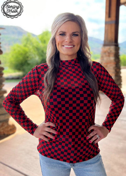 pep rally red and black mesh checkered long sleeve shirt.  This shirt runs a little larger than expected.  Suggested to pare down one size.  The model is wearing with faded jeans and a tank top under the mesh top.