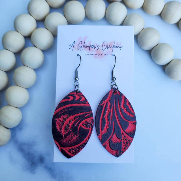 Red &amp; Black Western Floral Embossed Petal Leather Earrings are made of high-quality genuine leather.