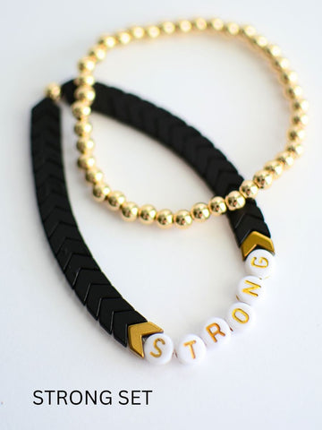"Strong" Black and gold bracelet set
