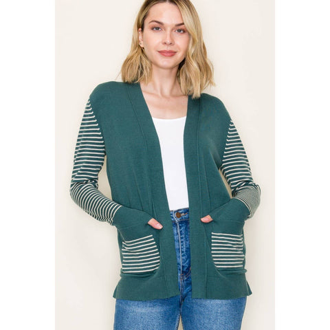 no button open cardigan dark aqua green with white striped sleeves and pockets. The cardigan has holes for thumbs
