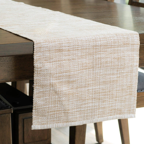 Beige woven table runner on a wooden table