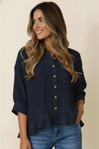 3/4 sleeve button down navy blue blouse with wooden buttons and a crisp collar