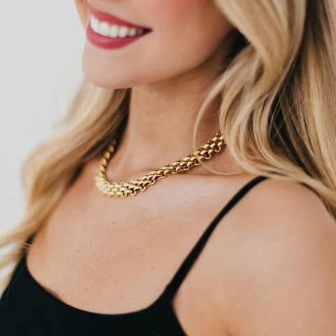 gold color woven chain necklace with length form 16-18 inches.  It's also waterproof