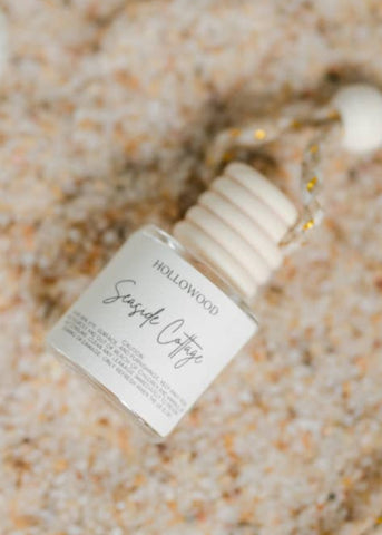 Experience the fresh, invigorating scents of spring every time you drive with our Spring Car Diffusers. Simply attach to your car's review and let the natural fragrances diffuse throughout your vehicle. How to use: Remove the wooden lid and place it to the side. Remove the plastic lid from the container, carefully place the wooden lid back on, and tilt the bottle upside down for a few seconds.&nbsp; Refresh the scent only when lid is dry. Caution: This product contains oil. Avoid skin, eye, surface, and fur