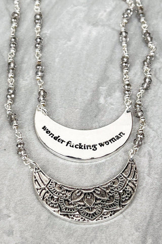 "Wonder F*&$@ woman" silver double-sided necklace can be worn with statement or adorned
