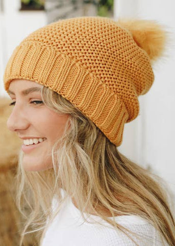 Pom Beanie with Faux Sherpa Lining