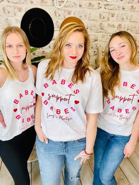Women wearing Babes Support Babes White T-Shirt with Pink Lettering